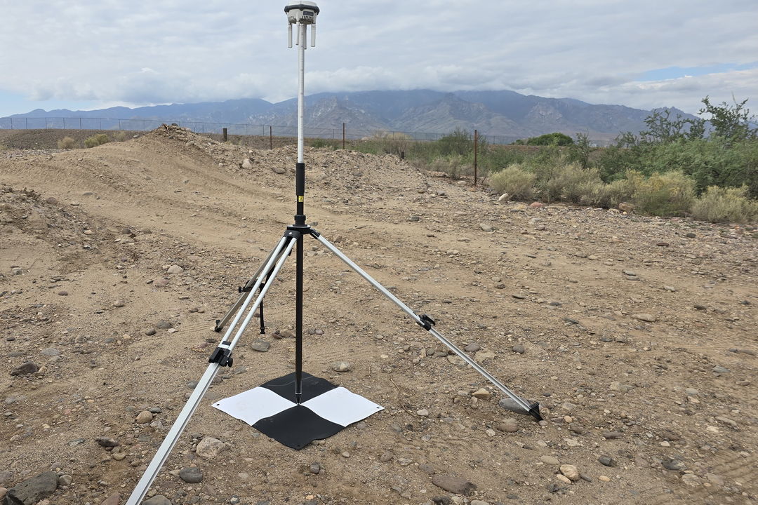 DJI D-RTK 3 GNSS base station on a tripod in the field