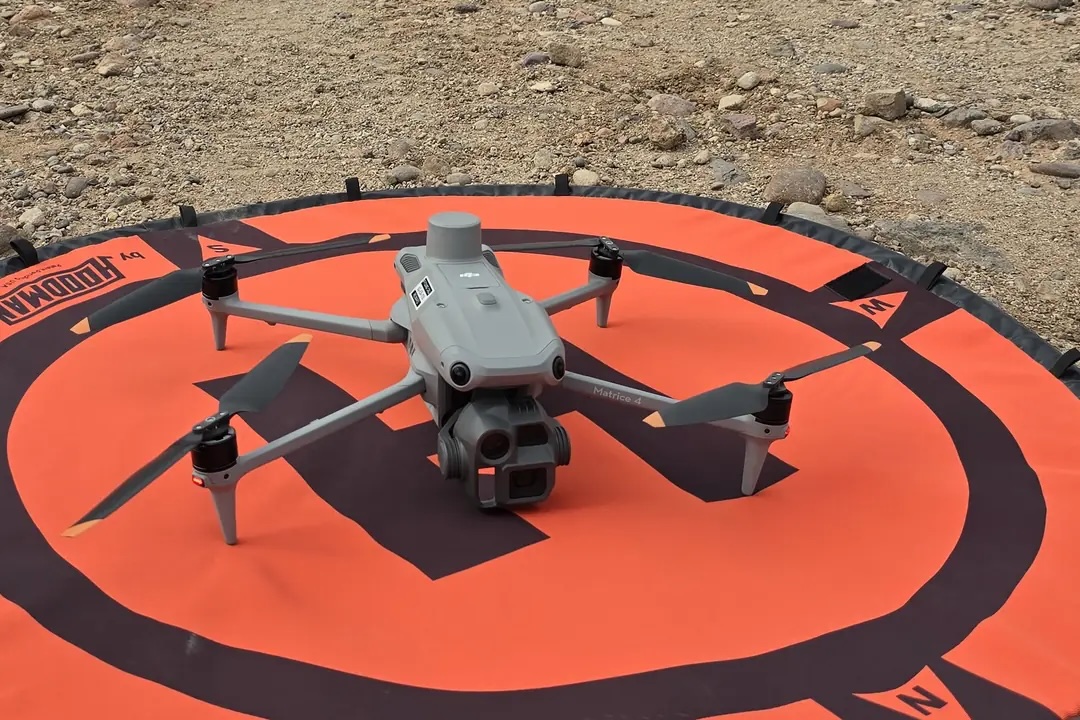 DJI Matrice 4E on an orange landing pad